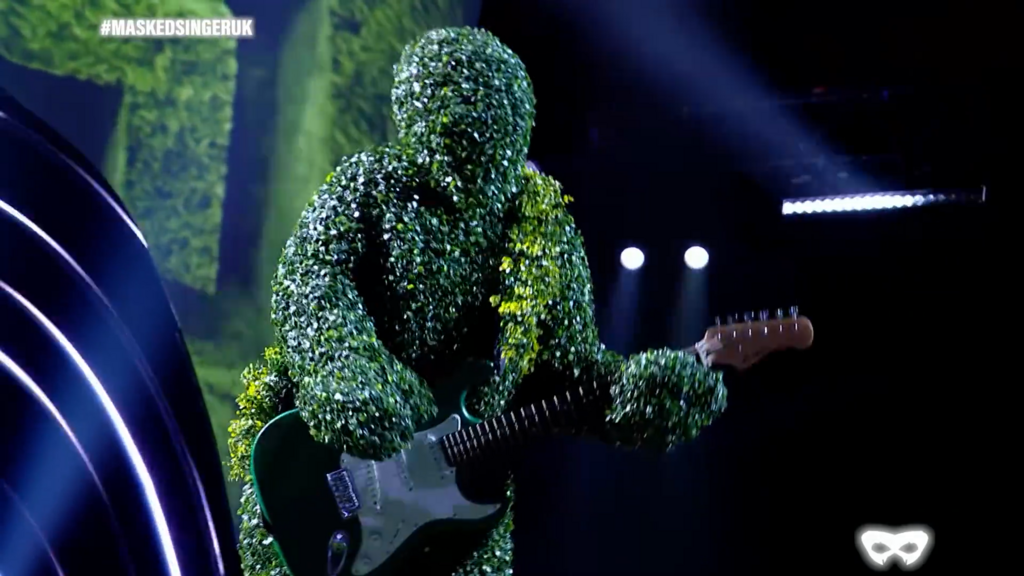 A Hedge Man performing on The Masked Singer.
