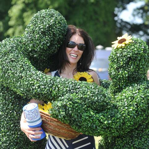 The Human Hedges performing at a Flower Show in Cumbria.