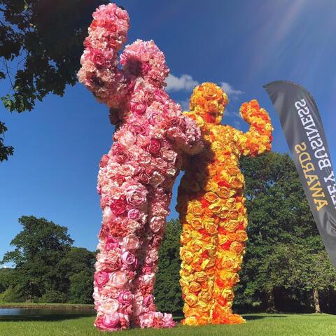 The Flower People meeting and greeting guests at a corporate awards event in Burnley