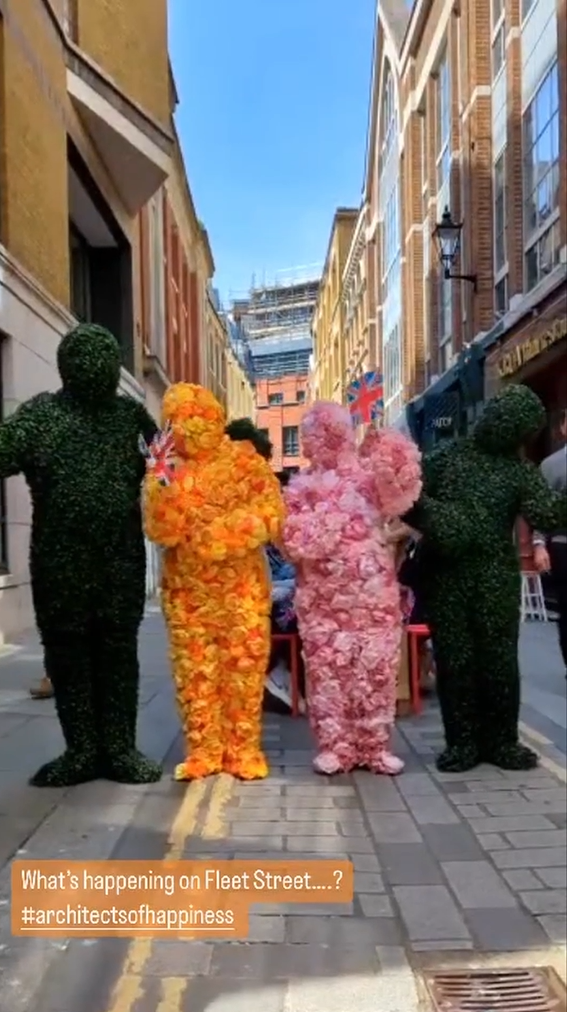The Hedge Men and Flower People performing at a coronation party in London