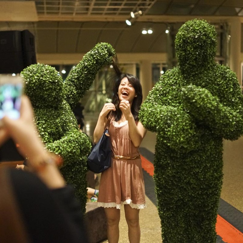 The Human Hedges entertaining people in a shopping centre in Singapore.